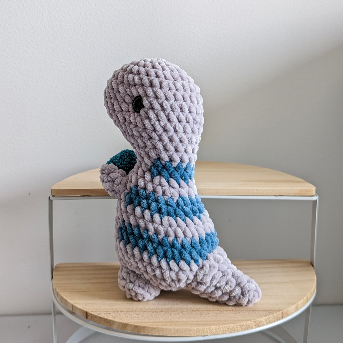 Dino - Grey and Teal holding a dino egg